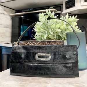 Prüne black rare leather handbag